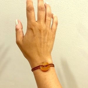 Brown chalcedony and silk pi disc bracelet. NWOT